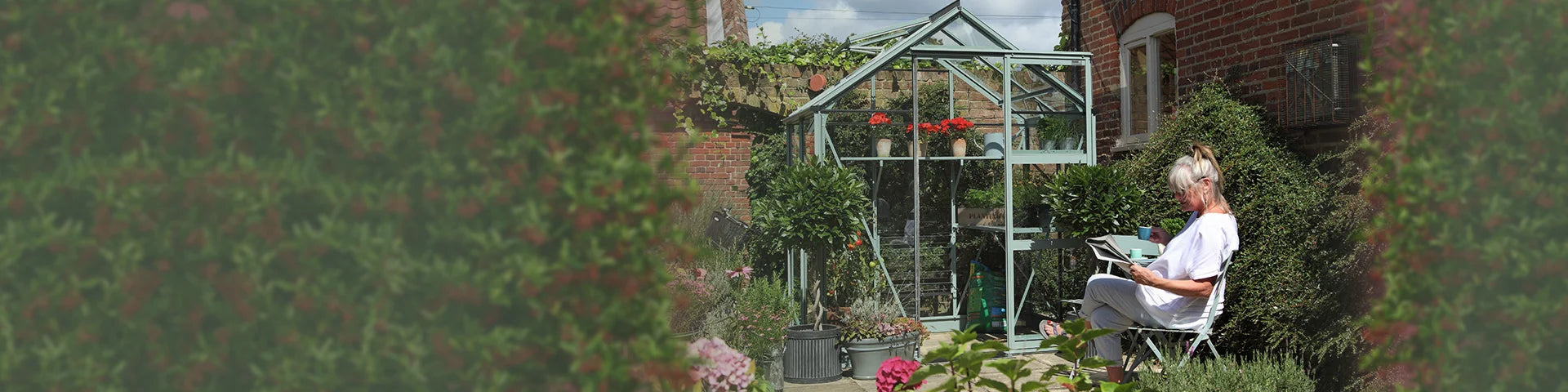 6x4 Rhino Premium Greenhouse in walled garden